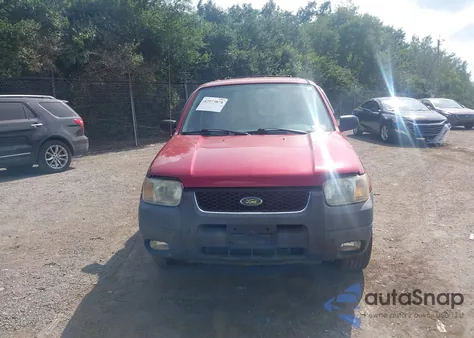 2003 Ford Escape Xlt z USA, uszkodzony, nr VIN 1FMYU03193KD92461